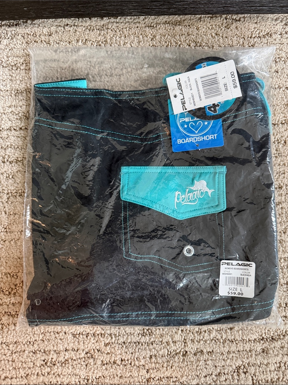 Pelagic Women's Black and Aqua Boardshorts